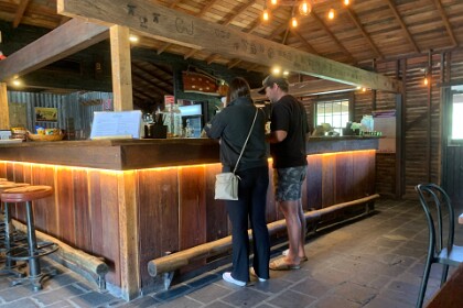 Exploring Wollombi, 12th September 2025 Inside the pub. An extensive menu can be seen on the left side of the bar.