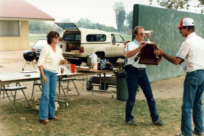 Bob's wife looks on.  I think that might be Jenni's new Honda Civic in the background.