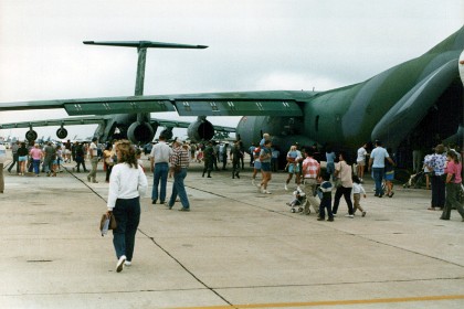 Jenni walks ahead anxious to look at the C5 Galaxy Transport