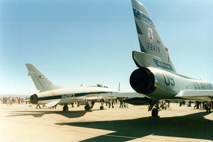 A privately owned F100 Super Sabre along side of an Air Guard F106 Delta Dart. Note the coke bottle fuselage to conform with the newly discovered supersonic area rule.