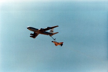 The f4 demonstrates its ability to be refuelled in flight behind a Boeing  KC-135 tanker.