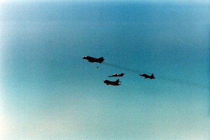 F4 Phantom, F5 Tiger, Crusader and a trainer fly in formation.