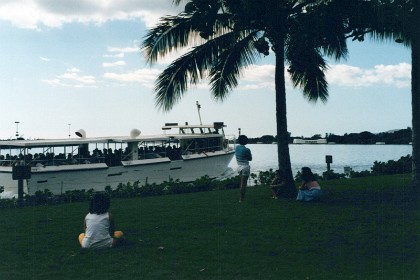 We arrive in Hawaii at 6pm on   Saturday 27, 1986.  &nbsp;  After checking in to a hotel we take a ferry to the Arizona Memorial in Pearl Harbor.  The memorial is to the right of coconut tree.