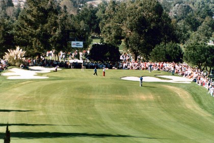 Putting out on the 16th. Calvin Peete wins the tournament with 21 under par, a tournament record.