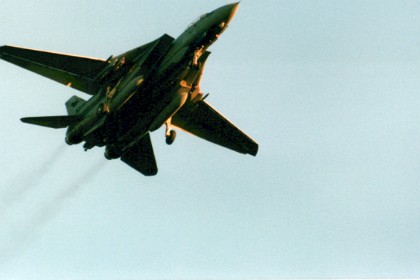 January, 1986   &nbsp; Dean and I sit in the car near Miramar NAS and watch the planes do touch and go's. This is an F14 practising carrier deck landings.