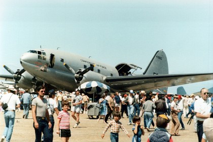 The Curtiss C-46 Commando is a twin-engine transport aircraft derived from the Curtiss CW-20 pressurised high altitude airliner design. Early press reports used the name "Condor III", but the Commando name was in use by early 1942 in company publicity.  Top speed: 433 km/h Wingspan: 33 m Range: 3,701 km Length: 23 m Engine type: Pratt & Whitney R-2800 Double Wasp First flight: 26 March 1940 Manufacturer: Curtiss-Wright, Buffalo, New York and Higgins Aircraft, Michoud LA