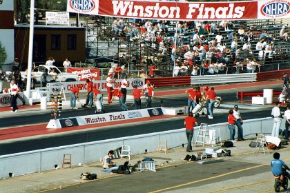 Before the top fuel semifinals, officials scrape about 5/16"   of rubber from the track surface.