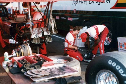 Darryl Williams mechanics rebuild his car after the race