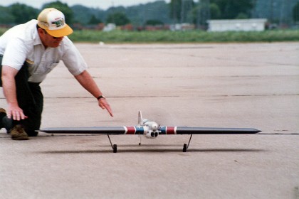 Bill Fitzgerald launches Ted Fancher's plane during the flyoffs.