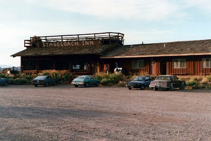 Our motel in the Capitol Reef National Park is called the Rim Rock Inn.  There are magnificent views  of the Henry Mountains 35 miles away from the Stagecoach restaurant where we have breakfast.  We love it so much that we come back again twenty years later.  That's Jenni's Honda in front of Room 10.