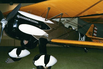 Curtis P-6E Hawk. Starting in 1925 with the P-1, Curtis built a long series of fighters carrying the name "Hawk." Of the eight different P-6 models produced, the P-6E remains the best known. Originally designated the Y1P-22, the U.S. Army Air Corps redesignated this aircraft the P-6E because of its similarity to the other P-6s. Curtiss delivered 46 P-6E Hawks, the last biplane fighter built in quantity for the Air Corps. Never used in combat, the P-6E is recognized as one of the most beautiful aircraft of the 1930s. TECHNICAL NOTES: Armament: Two .30-cal. machine guns Engine: Curtiss V-1570 of 600 hp Maximum speed: 204 mph Cruising speed: 167 mph Range: 480 miles Ceiling: 24,400 ft.  Span: 31 ft. 6 in. Length: 23 ft. 2 in. Height: 8 ft. 11 in. Weight: 3,432 lbs. loaded