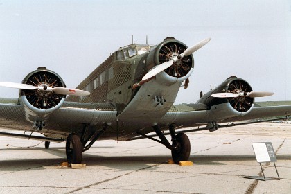 Junkers Ju 52. The Ju 52 trimotor, like the USAF C-47, was first built in the 1930s and remained in service for more than a quarter century. This transport made its maiden flight in April 1931, and three years later, a heavy bomber version appeared. The latter aircraft formed the nucleus of the Luftwaffe's infant bomber force in the mid-1930s, and it was used during the Spanish Civil War.  TECHNICAL NOTES (transport version): Armament: Four 7.9mm machine guns Engines: Three BMW 132T-2 engines of 830 hp each  Maximum speed: 178 mph Cruising speed: 134 mph Range: 810 miles Service ceiling: 19,360 ft. Span: 95 ft. 11 1/2 in. Length: 62 ft. Height: 18 ft. 2 1/2 in. Weight: 24,250 lbs. loaded Serial number: T.2B-244 (CASA 352L)