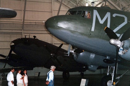 Douglas C-47D Skytrain. Few aircraft are as well known, were so widely used or used as long as the C-47. Affectionately nicknamed the "Gooney Bird," this aircraft was adapted from the Douglas DC-3 commercial airliner. The U.S. Army Air Corps ordered its first C-47s in 1940, and by the end of World War II, procured a total of 9,348. These C-47s carried personnel and cargo around the globe. They also towed troop carrying gliders, dropped paratroops into enemy territory, and air evacuated sick or wounded patients. A C-47 could carry 28 passengers, 18-22 fully equipped paratroopers, about 6,000 lbs. of cargo or 18 stretchers and three medical personnel.  TECHNICAL NOTES: Engines: Two Pratt & Whitney R-1830s of 1,200 hp each Maximum speed: 232 mph Range: 1,513 miles