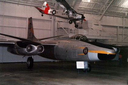 North American B-45C Tornado. The B-45 achieved many "firsts." It was the first American four-engine jet bomber to fly; the first American production jet bomber; the first jet bomber capable of carrying an atomic bomb; and the first multi-jet reconnaissance aircraft to refuel in mid-air. TECHNICAL NOTES: Armament: Two .50-cal. machine guns in the tail and 22,000 lbs. of bombs Engines: Four General Electric J47s of 6,000 lbs. thrust each Maximum speed: 570 mph Range: 1,000 miles Ceiling: 37,550 ft. Span: 89 ft. Length: 75 ft. 4 in. Height: 25 ft. 2 in. Weight: 110,000 lbs. maximum  Serial number: 48-0010