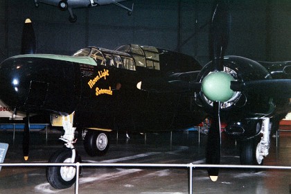 Northrop P-61C Black Widow. The heavily-armed Black Widow was the United States' first aircraft specifically designed as a night-fighter. The P-61 carried radar equipment in its nose that enabled its crew of two or three to locate enemy aircraft in total darkness and fly into proper position to attack. TECHNICAL NOTES: Armament: Four .50-cal. machine guns in upper turret and four 20mm cannons in belly; 6,400 lbs. of bombs Engines: Two Pratt & Whitney R-2800s of 2,100 hp each Maximum speed: 425 mph Cruising speed: 275 mph Range: 1,200 miles Ceiling: 46,200 ft. Span: 66 ft. Length: 49 ft. 7 in. Height: 14 ft. 8 in. Weight: 35,855 lbs. loaded Serial number: 43-8353