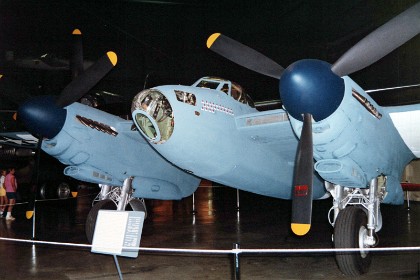 De Havilland DH 98 Mosquito. The famous British Mosquito – known to many as "Mossie" – was a versatile aircraft used extensively during World War II. Constructed primarily of plywood with a balsa wood core, it had excellent speed, altitude and range. First flown on November 25, 1940, the Mosquito entered production in mid-1941 and was produced until well after the end of the war. Almost 8,000 Mossies were built in Great Britain, Canada, and Australia.  TECHNICAL NOTES: Armament: 4,000 lbs of bombs in bomber version Engines: Two Rolls-Royce Merlins of 1,690 hp each Maximum speed: 415 mph Range: 1,955 miles Ceiling: 42,000 ft