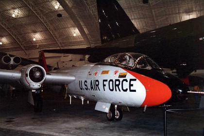 Martin B-57B Canberra. After the Korean War began in 1950, the U.S. Air Force looked for a jet powered medium bomber to quickly replace the aging, propeller driven Douglas B-26 Invader. In March 1951 the USAF contracted with Martin to build the British Canberra in the United States under license. The Martin built B-57 made its first flight in July 1953, and when production ended in 1959, a total of 403 Canberras had been produced for the USAF. TECHNICAL NOTES: Armament: Eight .50-cal. M3 machine guns or four 20mm M39 cannons and approx. 7,500 lbs. maximum of internal and external stores Engines: Two Wright J65-W-5 turbojets of 7200 lbs. static thrust each Maximum speed: 570 mph Cruising speed: 450 mph Range: 2,000 miles Ceiling: 49,000 ft. Span: 64 ft. Length: 65 ft. 6 in. Height: 15 ft. 6 in. Weight: 58,800 lbs. maximum