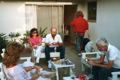 Tom Lay and friend, Sue Whitley walks away - both Tom and Sue have passed away.  Jim Armour effects repairs to his sunnies.