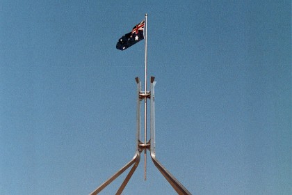 I think the elegant flag pole is out of place on an inelegant building