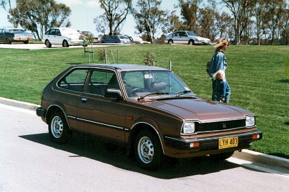 It is a 1982 two speed Honda Civic, similar to the car I had in America but it a semi-automatic. How do three adults and two kids fit in this car?