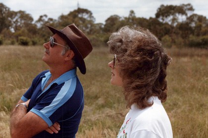 Brian judges while Bonnie writes his scores down.