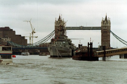 HMS Belfast is a Town-class light cruiser that was built for the Royal Navy. She is now permanently moored as a museum ship on the River Thames in London and is operated by the Imperial War Museum. London Bridge City Pier is to the right; it connects with the London Bridge rail station.