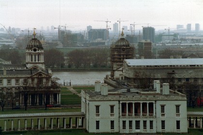 This is the Queens House which is a former royal residence built between 1616 and 1635 . Its architect was Inigo Jones, for whom it was a crucial early commission, for Anne of Denmark, the queen of King James I.  The walkway to the left leads to the National Maritime Museum.  King George VI formally opened the museum on 27 April 1937 when his daughter Princess Elizabeth accompanied him for the journey along the Thames from London..