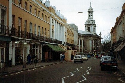 This is St Alfege Church. It is dedicated to Alfege, Archbishop of Canterbury, and reputedly marks the place where he was martyred on 19 April 1012, having been taken prisoner during the sack of Canterbury by Danish raiders the previous year. The Danes took him to their camp at Greenwich and killed him when the large ransom they demanded was not forthcoming.  The church was rebuilt in 1712–1714.