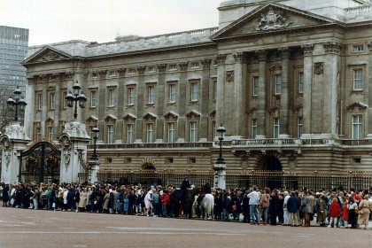 Crowds gather at Buckingham Palace for the changing of the guards.