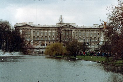 The front of Buckingham Palace from St James's Park, St James's Park Lake in foreground. Buckingham House was a large townhouse built for the Duke of Buckingham in 1703 on a site that had been in private ownership for at least 150 years. It was acquired by King George III in 1761 as a private residence for Queen Charlotte and became known as The Queen's House. During the 19th century it was enlarged by constructing three wings around the central courtyard. Buckingham Palace became the London residence of the British monarch on the accession of Queen Victoria in 1837.