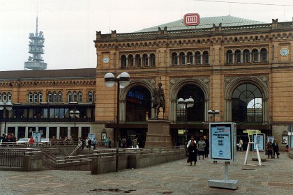 Deutsche Bahn train station in Hanover.  The tower behind is the Deutsche Bundespost Tower that began operations in April 1960. In 2000, Volkswagen AG acquired the tower for a symbolic price.  The purchase was made because the Volkswagen Commercial Vehicles (VWN) division is based in Hanover and, with around 15,000 employees, it is one of the largest employers in the region. Nowadays this is called the VW Tower.