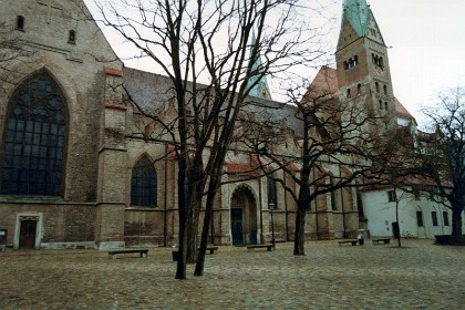 Outside of the Cathedral. Behind me in the courtyard are some Roman ruins which I do not see at the time.