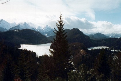 Alpsee (L) and Schwansee (R) to the SW of Neuschwanstein still in Germany. The Austrian Alps are in the background.