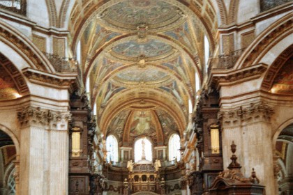 We go into St Paul's Cathedral. We're standing under the Great Dome Looking towards the Apse and High Altar. A pulpit is on the right.