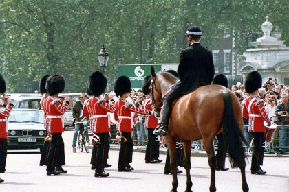 Changing of the guard. My best guess is that these are the Welsh Guards (buttons 5 in a row, plume left side, shoulder badge)