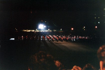 Night time falls as the ceremony ends.