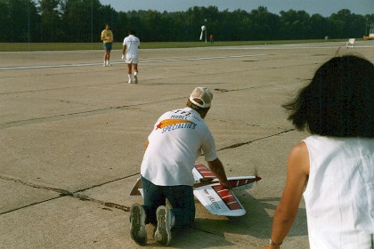 I hold the handle as Kaz walks to the centre to begin his flight. Miyako watches on while Kaz wears white gloves as is the Japanese way.