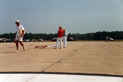 Don McLave from Washington state carries flight  stuff away after Paul Walker's flight.