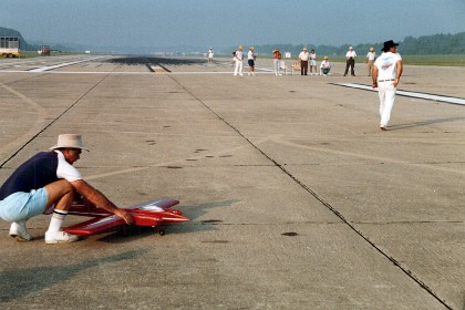 Brian gets ready to launch Bob's twin 35 powered plane.