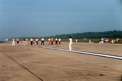 Bob flies the judges' warmup. Jenni is in the red shirt in the background judging his flight.