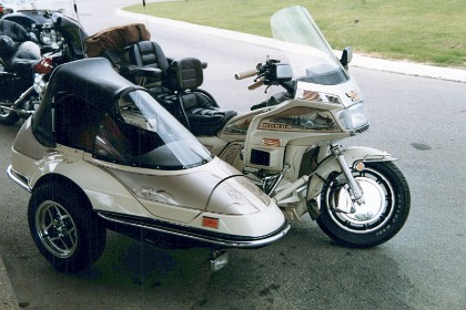 Honda Goldwing and sidecar with CB radio, trip computer, auto-adjust suspension and many other goodies.