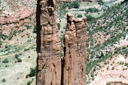 Canyon de Chelly National Monument is a vast park in northeastern Arizona, on Navajo tribal lands. Its prominent features include Spider Rock spire, about 800-feet tall, and towering sandstone cliffs surrounding a verdant canyon.