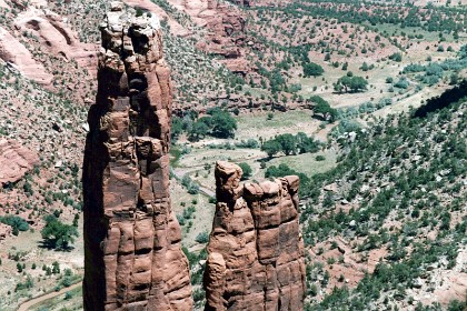 The park's distinctive geologic feature, Spider Rock, is a sandstone spire that rises 750 feet  from the canyon floor at the junction of Canyon de Chelly and Monument Canyon. Spider Rock can be seen from South Rim Drive.