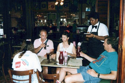 We had separated from the Eathers for a while but  we meet up with them again at Pat O'Briens for lunch. We have Jumbalaya and Gumbo, creole specialties. For drinks, I forgo my vow to eschew the demon alcohol and, forgetting myself for the moment, have an alcoholic drink called the Hurricane.