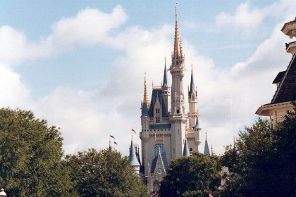 Saturday July 23, 1988   We visit the Magic Kingdom.  Brian's feet are very bad so he stays behind in the motel at Gainsville while the rest of us go to Disneyland. Cinderella's Castle is in the background and seems bigger than California's Castle.