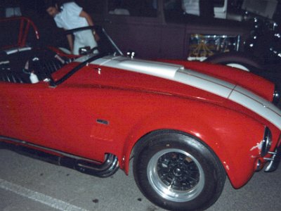 Shelby Cobra. If it's genuine and not a kit car, it is one of America's most expensive cars.