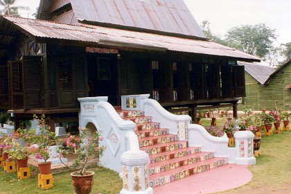 Part of the tour at Malacca is to stop at someone's house and look around inside it. This is the Men's entrance. Only men are permitted in the front room