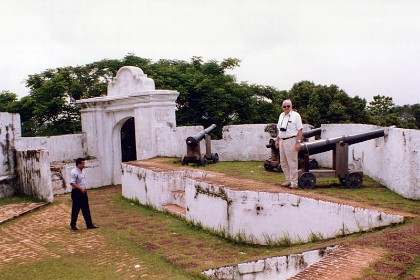 Inside St John's fort. Roger Nicholson mans the guns.