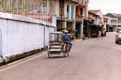 Rickshaws still exist in this part of Malaysia.