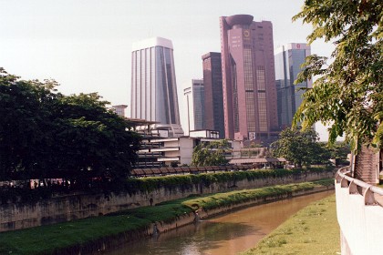 Magnificent buildings beside the Sungai Kelang (or Kelang River). &nbsp; K.L. sits astride the confluence of the Kelang and Gombak rivers; Kuala Lumpur in Malay means “muddy estuary.”